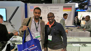 These doctors from Barbados stopped by our booth and got a free swag bag with their purchase!