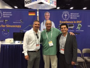 Two AAO attendees with one of our own AED staff.